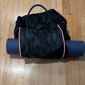 Black Gym Bag with Orange Accents with Yoga Mat Storage